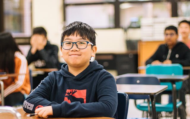 STEM Pupil Sitting At Desk